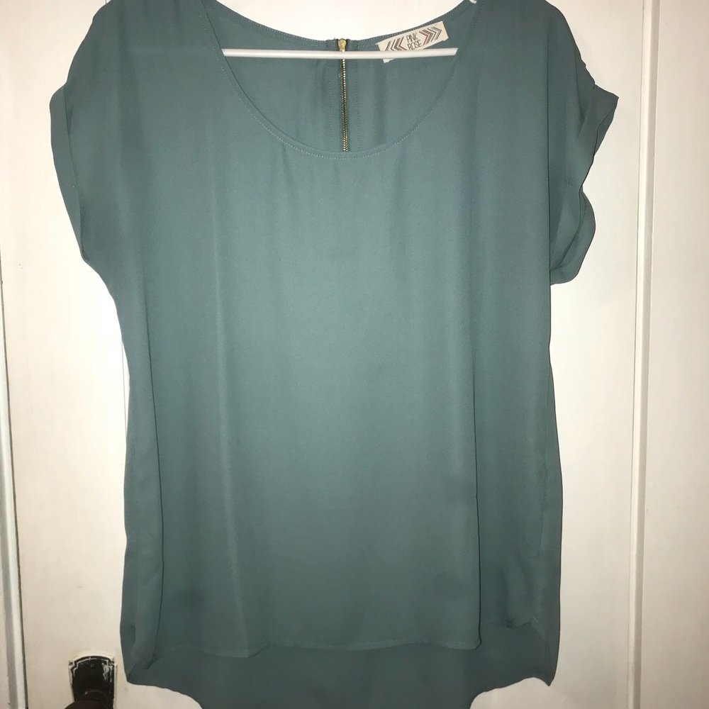 Green/teal top. Sheer lightweight fabric